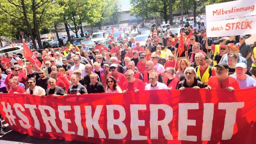 German Auto Workers Protest Social Right Restrictions